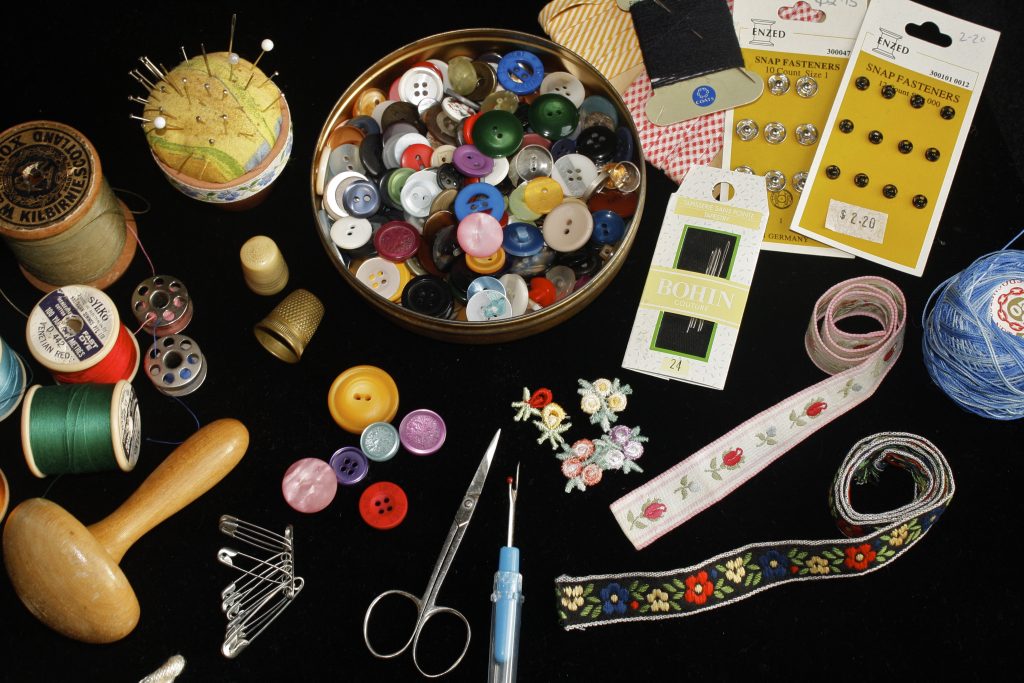 sewing equipment--buttons, thread, needles, scissors, safety pins, snaps