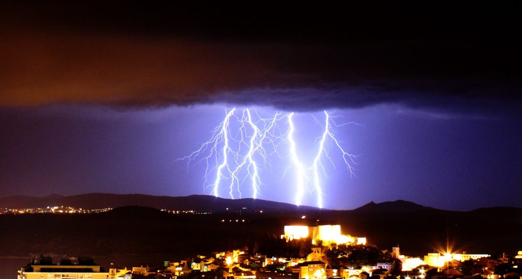 Lightning bolt over town
