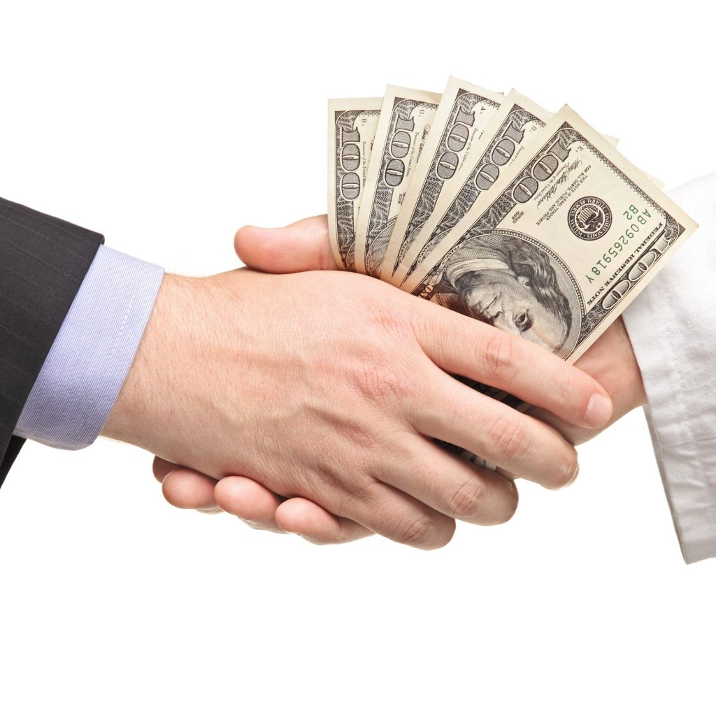 Money changing hands